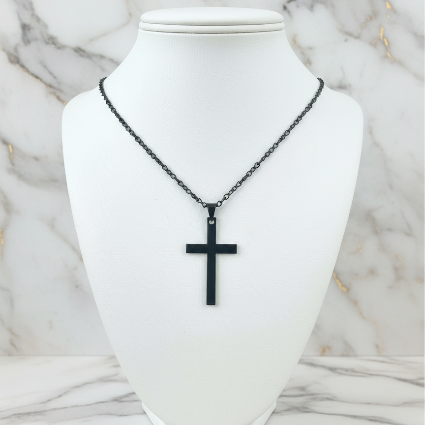 Black Cross Necklace on mannequin with marble background