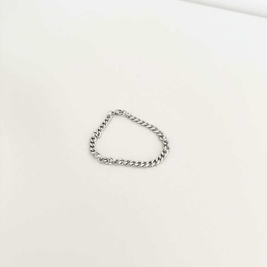Silver Bracelet on White Counter