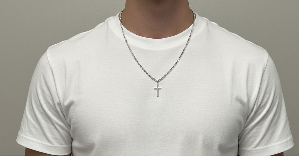 Silver Cross Necklace on White T-Shirt